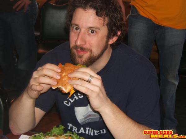 fat guy eating cheeseburger. Stockfun young fat black guy